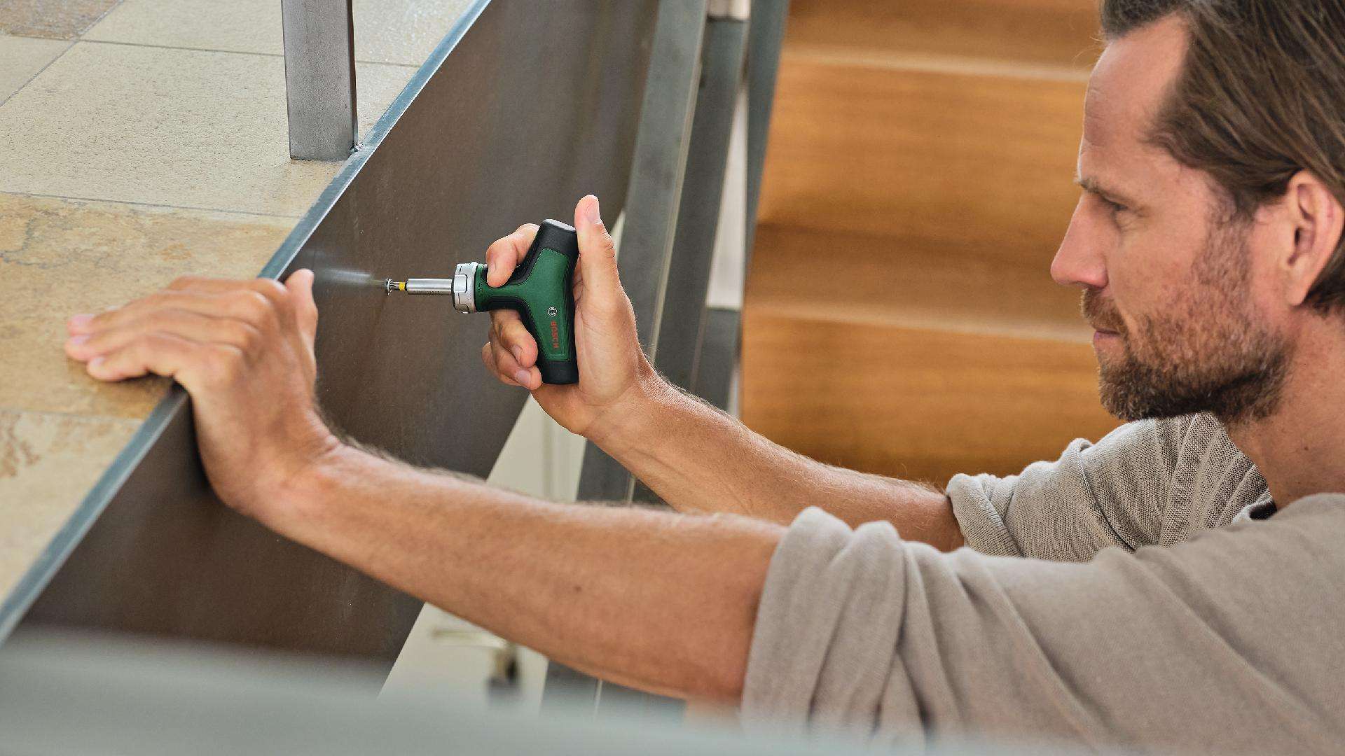 Punho em T com roquete c/bits refª 1600A02Z9T BOSCH